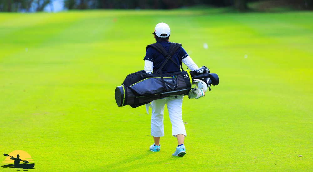 A girl is walking with a golf bag